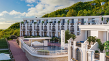 Wyndham Grand Residences Batumi Gonio. Riviera es el único hotel adosado de Batumi. Su finalización está prevista para 2025. El complejo consta de casas adosadas únicas de tres plantas (130 a 151 m², acristalamiento panorámico) situadas en la ladera Wyndham Grand Residences Batumi Gonio. Riviera